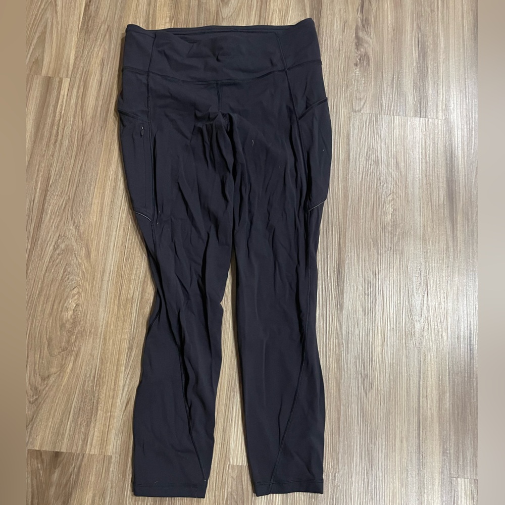 Lululemon black leggings with zipper pockets size 8